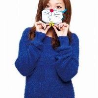 Un masque Doraemon et sa petite clochette